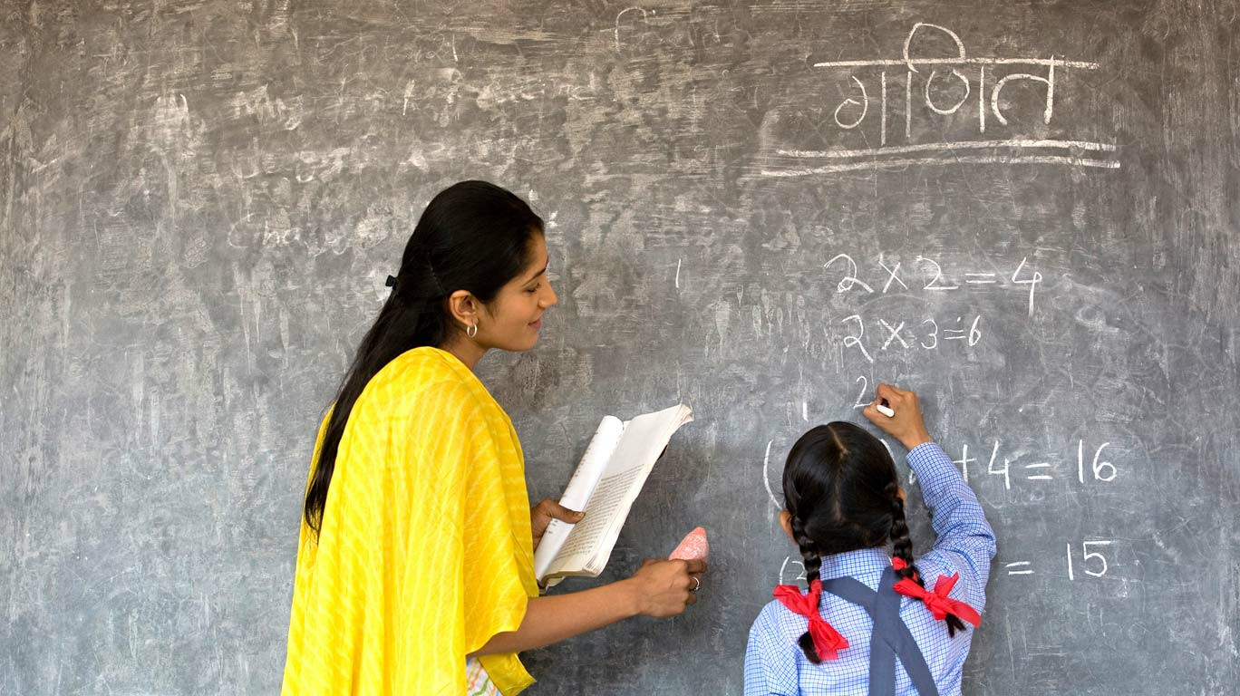 Delhi school girl with teacher